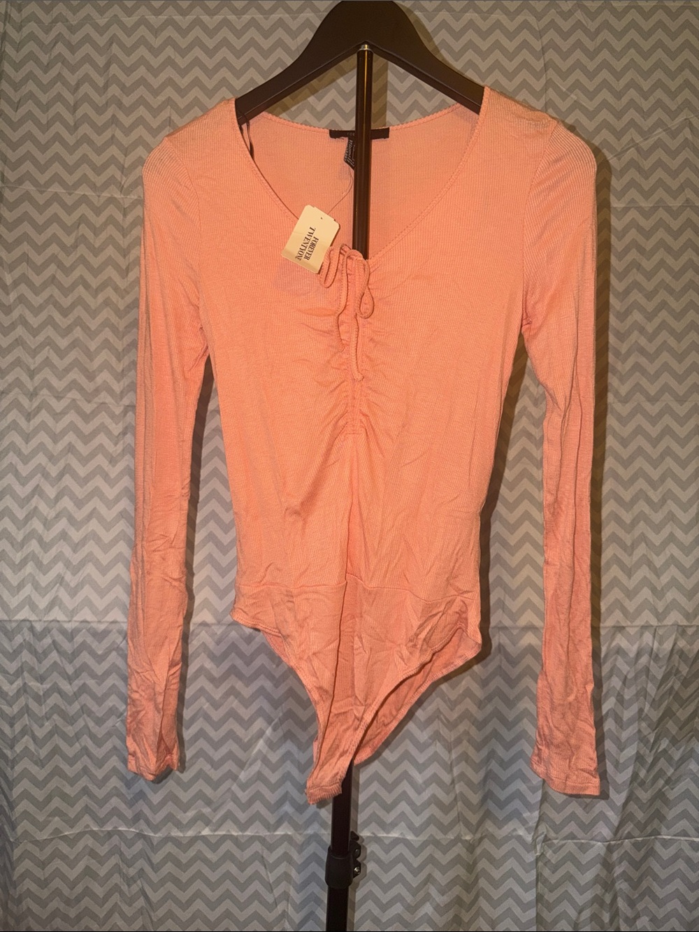 Forever 21 Peach Long Sleeve Ruched V-Neck Bodysuit